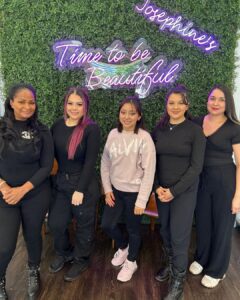 SnapInsta.to_502960227_18505563304051250_2624461939415237009_n Five women smile in front of Josephine's Aveda Salon & Spa neon sign in Houston, TX—luxury hair, beauty, and spa experts dedicated to your beautiful transformation. | Josephine's Salons and Spas | Houston, TX