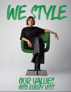 A hairstylist in a luxury Houston Aveda salon sits in an eco-friendly chair with the text, “We style our values into every visit.” | Josephine's Salons and Spas | Houston, TX